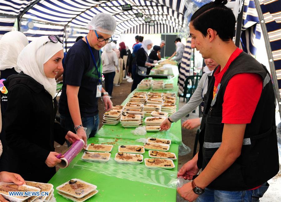 SYRIA-DAMASCUS-RAMADAN-CHARITY-MEALS