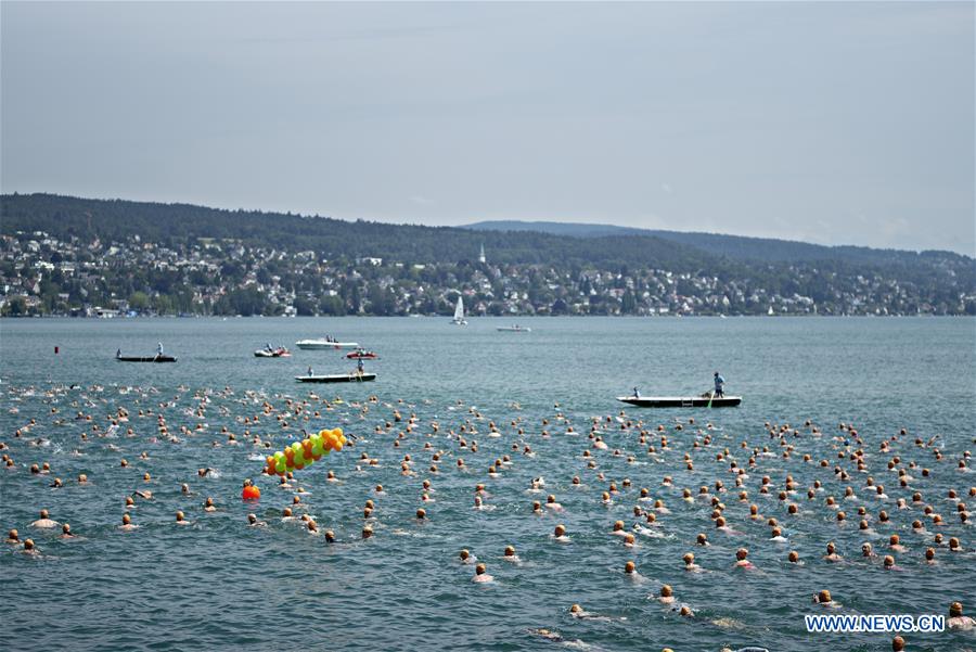 SWITZERLAND-ZURICH-LAKE CROSSING-SWIMMING