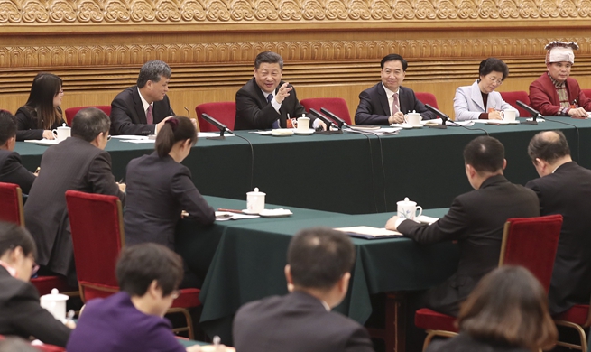 Chinese leaders join national legislators in panel discussions