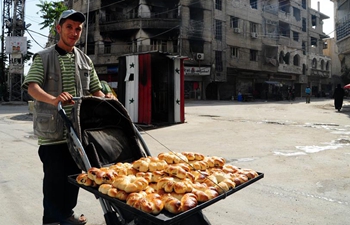 People in area of Eastern Ghouta observe holy month of Ramadan