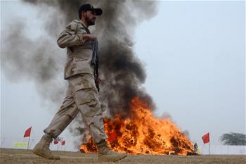 Pakistani anti-narcotics force destroys seized drugs and illegal liquor